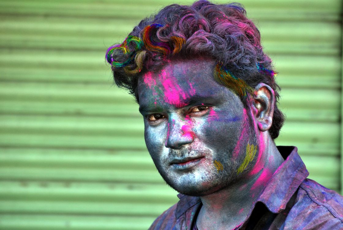 Portrait of a Man with Colored Powders on His Face · Free Stock Photo