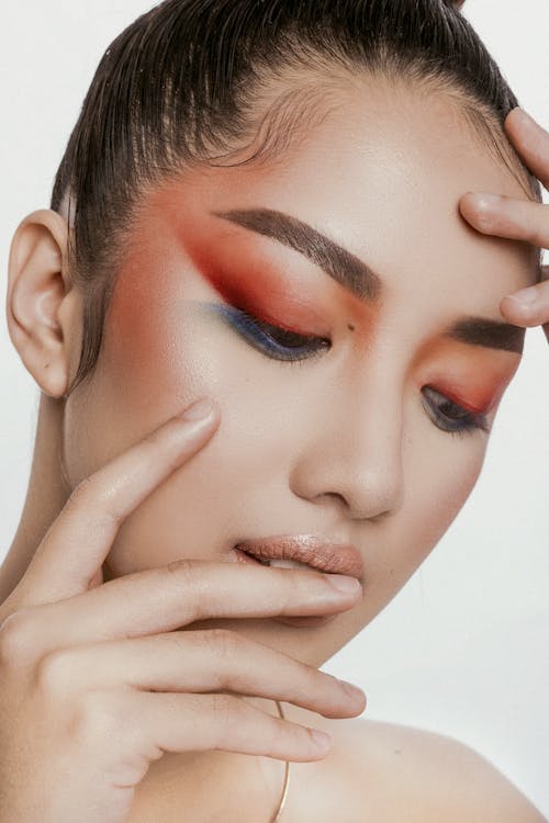 Close Up Photo of Woman with Colorful Eyeshadow Makeup 