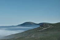 Green Mountain Near Sea of Clouds