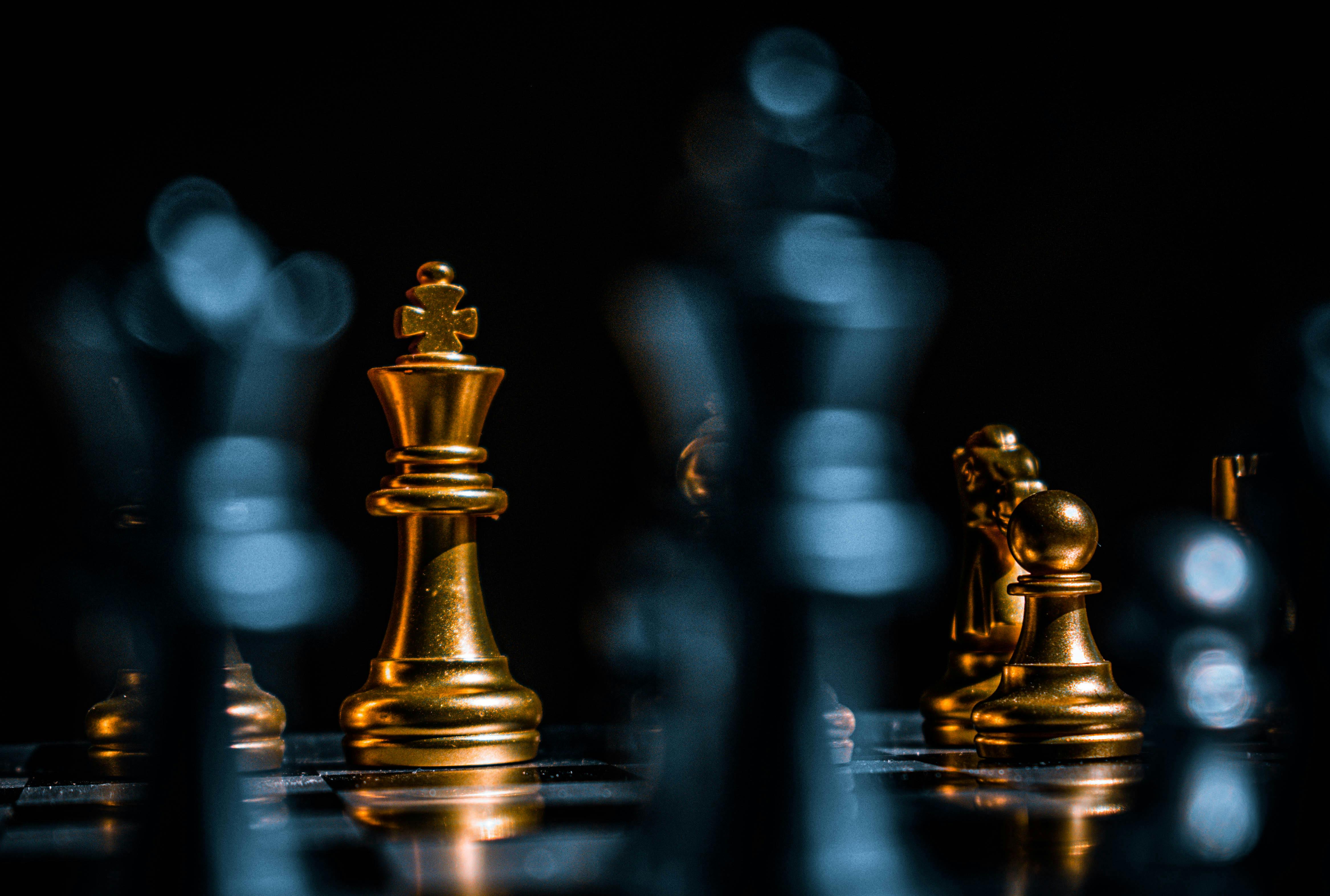 Browse Free HD Images of Dark Wooden Chess Pieces Against A Black Background