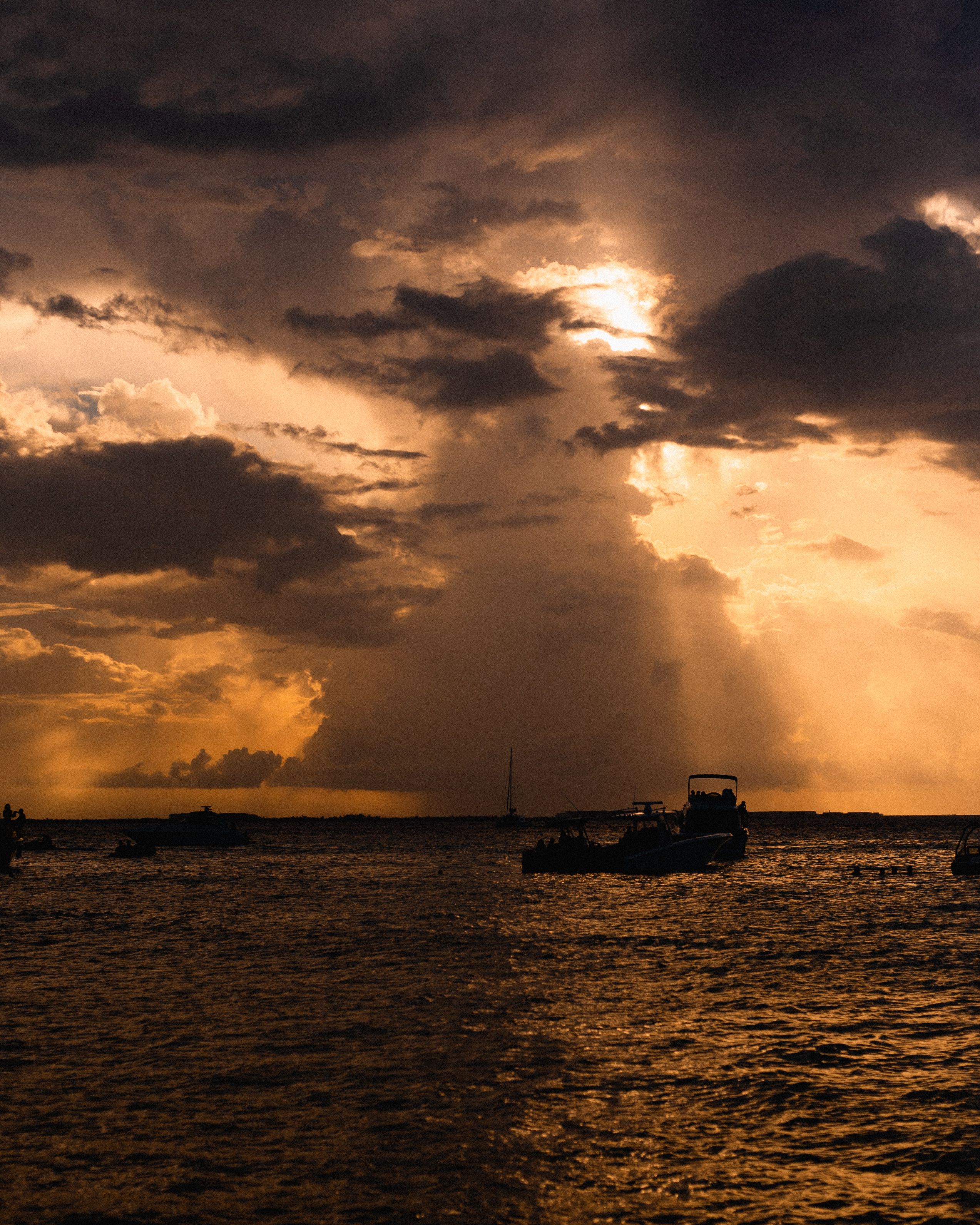Silhouette of Boat on Sea during Sunset · Free Stock Photo