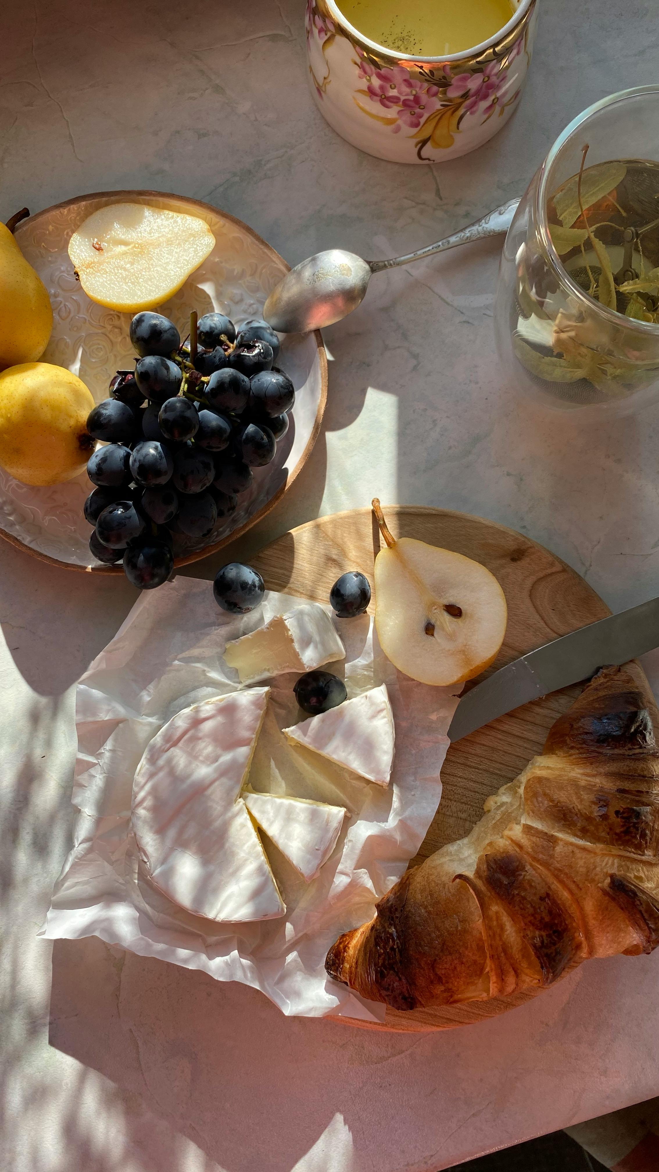 delicious desserts and fresh fruits on table at home