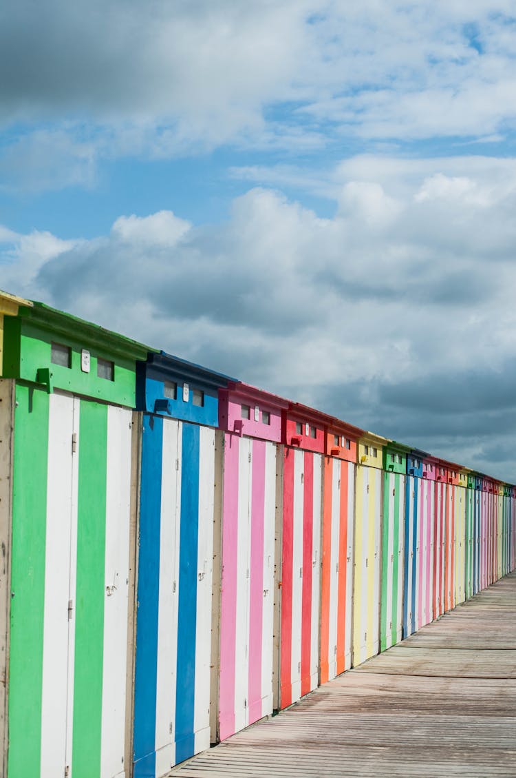 Colorful Vertical Stripes On Wooden Wall