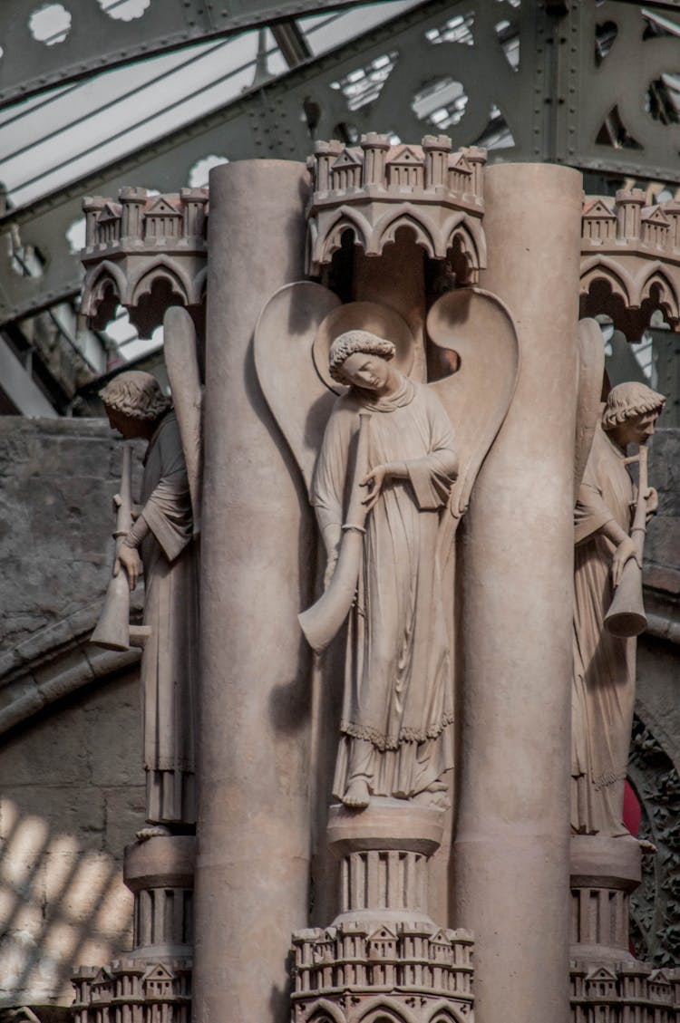 Wooden Sculptures Of An Angel Statues