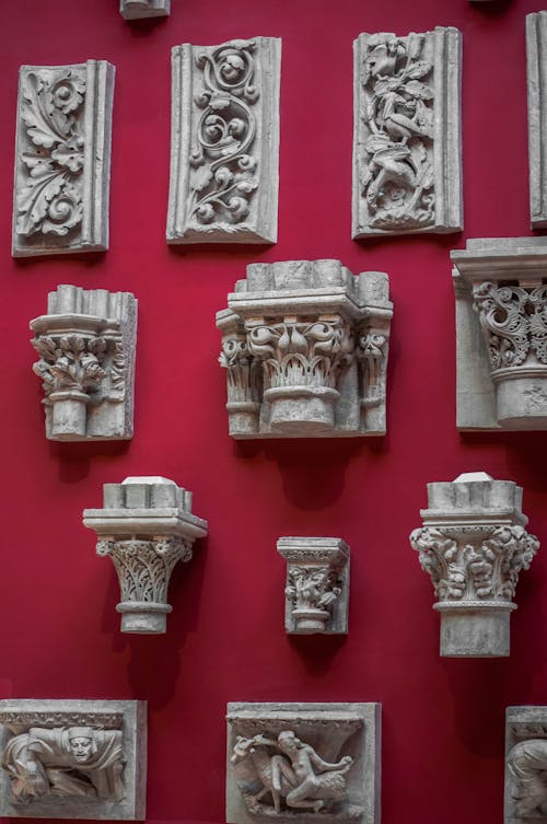 Bas Relief Selection on a Red Wall