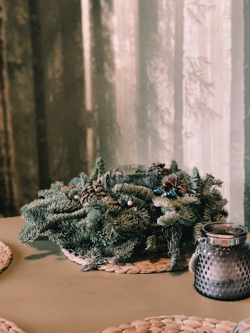 Free Pine Cones and Leaves on a Table Stock Photo