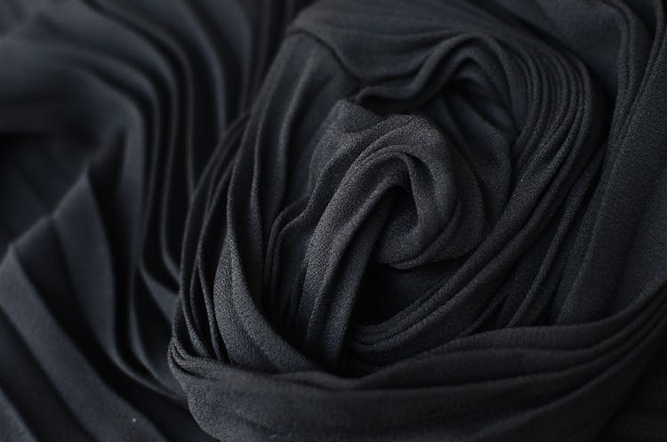 Abstract Background Of Black Fabric On Table