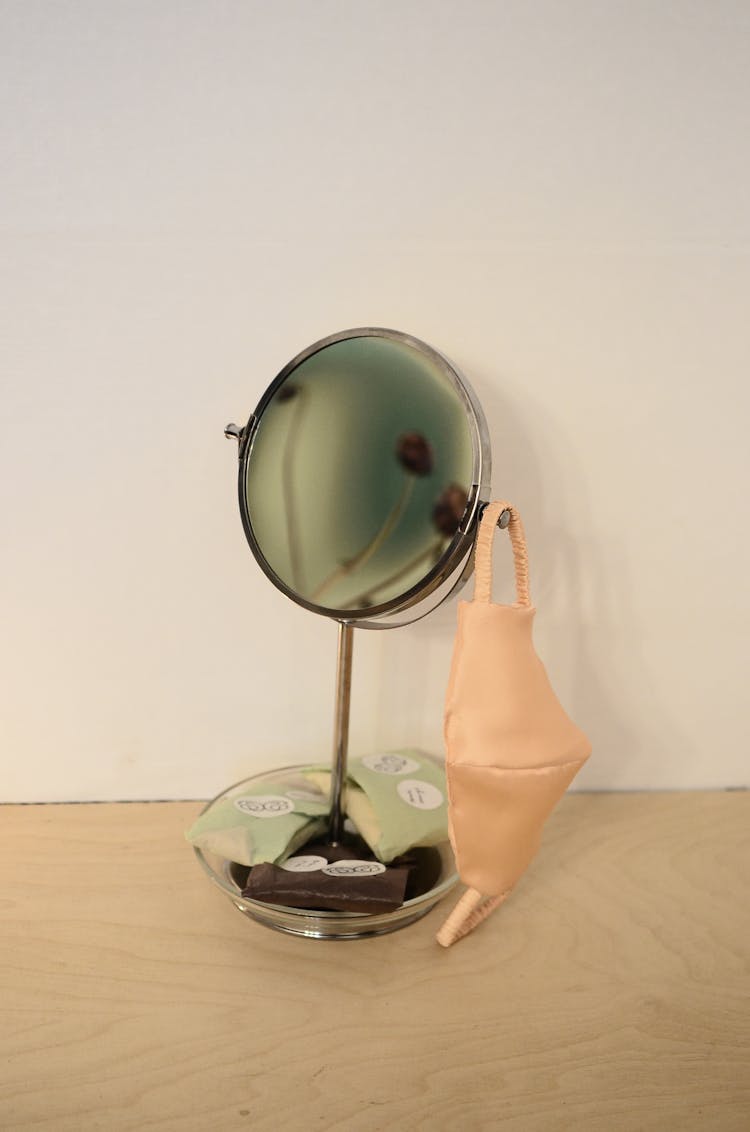 Reusable Face Mask Hanging On Table Mirror