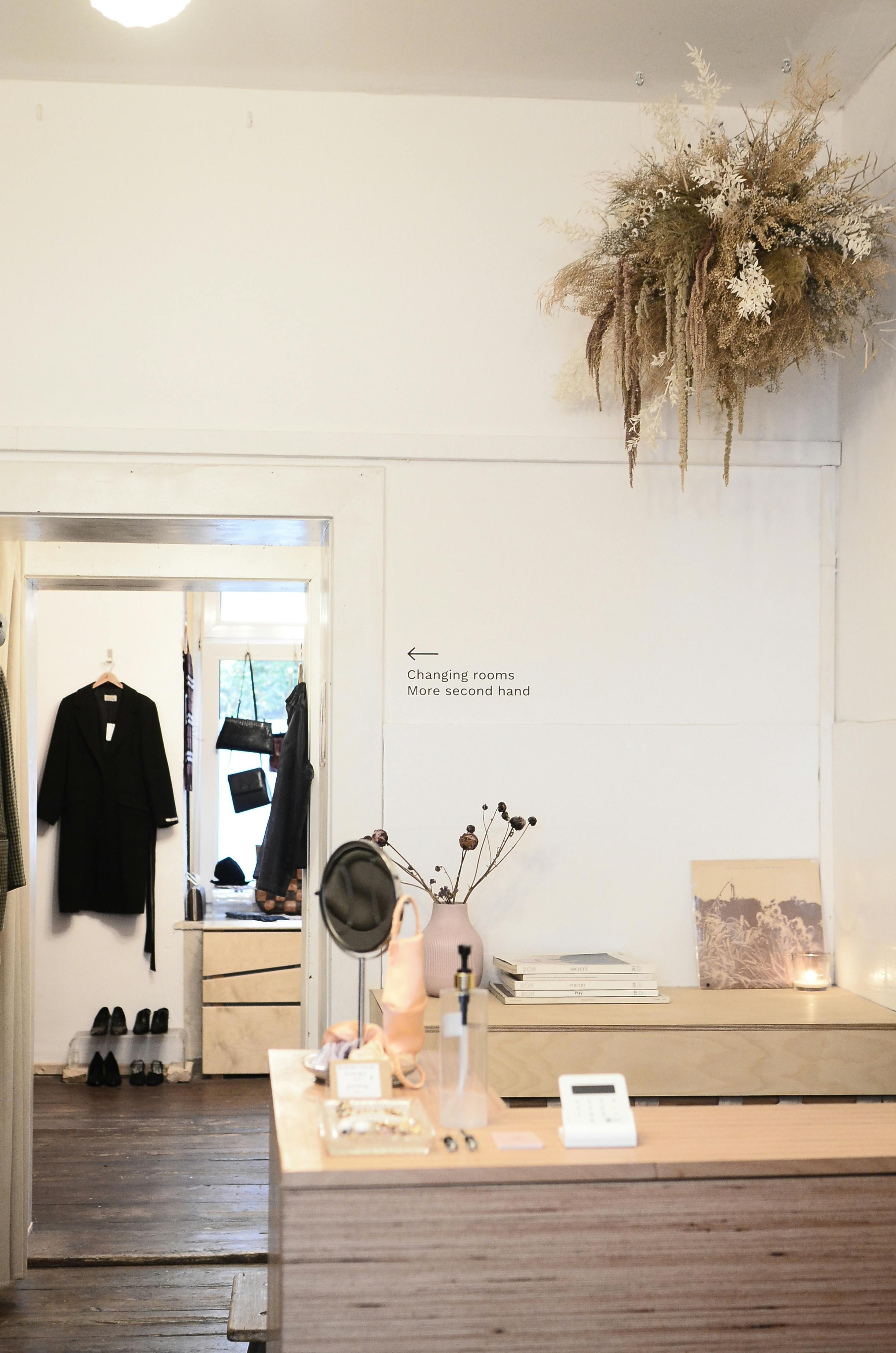 interior of modern light clothes shop