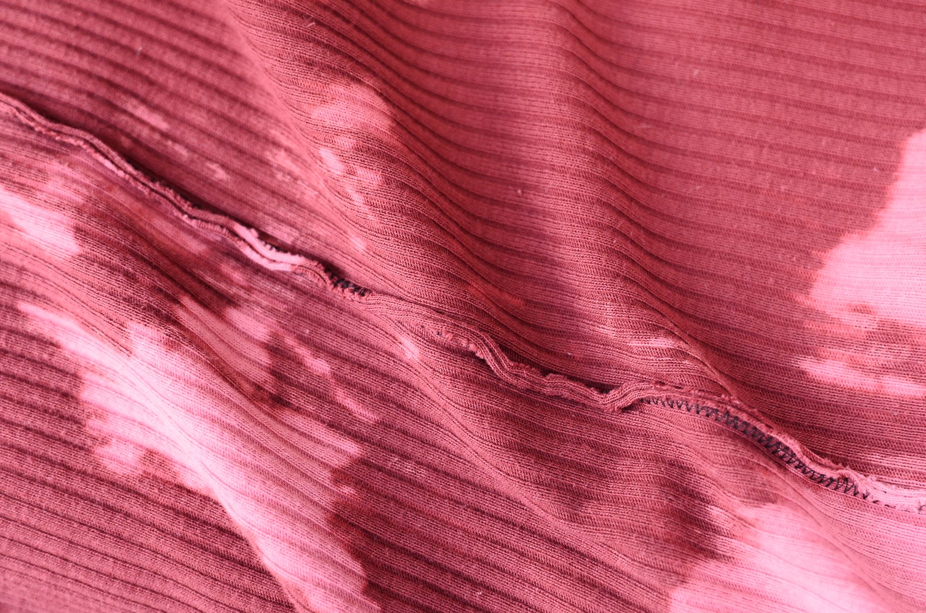 Close-up of a garment seam and fabric weave