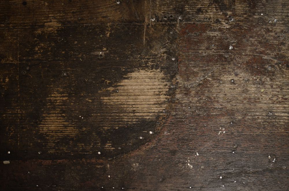 Old cracked wood boards before repair or refinishing.