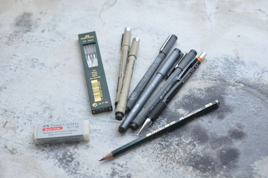 Collection of various pencils and markers for drawing
