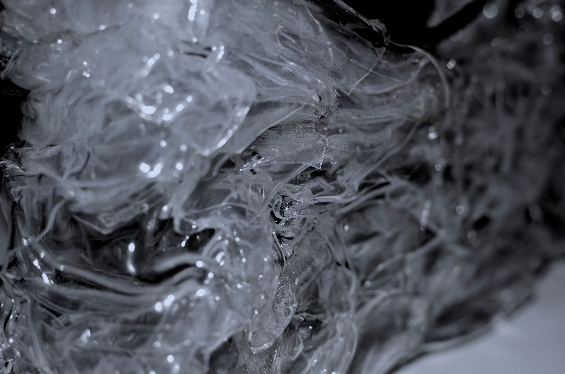 Abstract background of frozen surface with ice surface creating clean transparent shapeless texture
