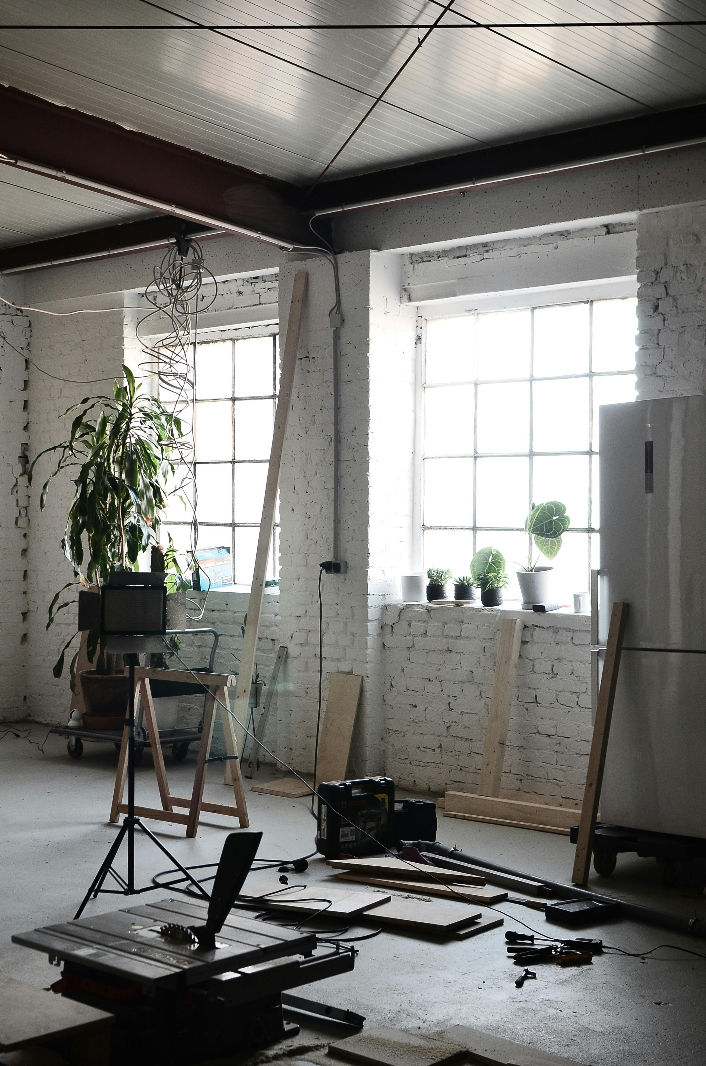 interior of spacious room with supplies for renovation works