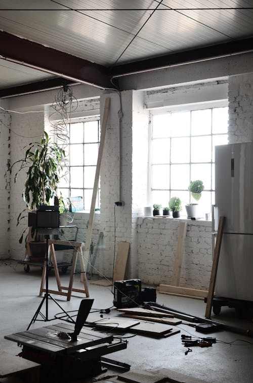 Interior of spacious room with supplies for renovation works