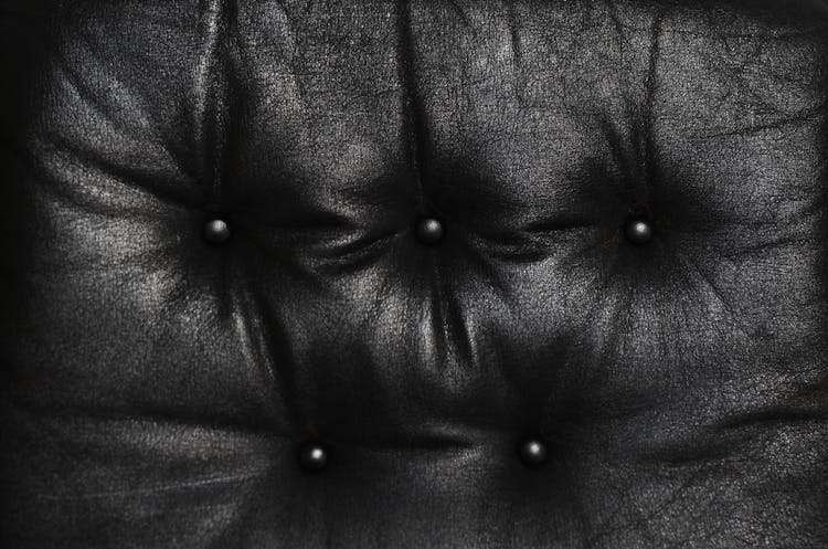 Cushion Of Black Leather Weathered Sofa