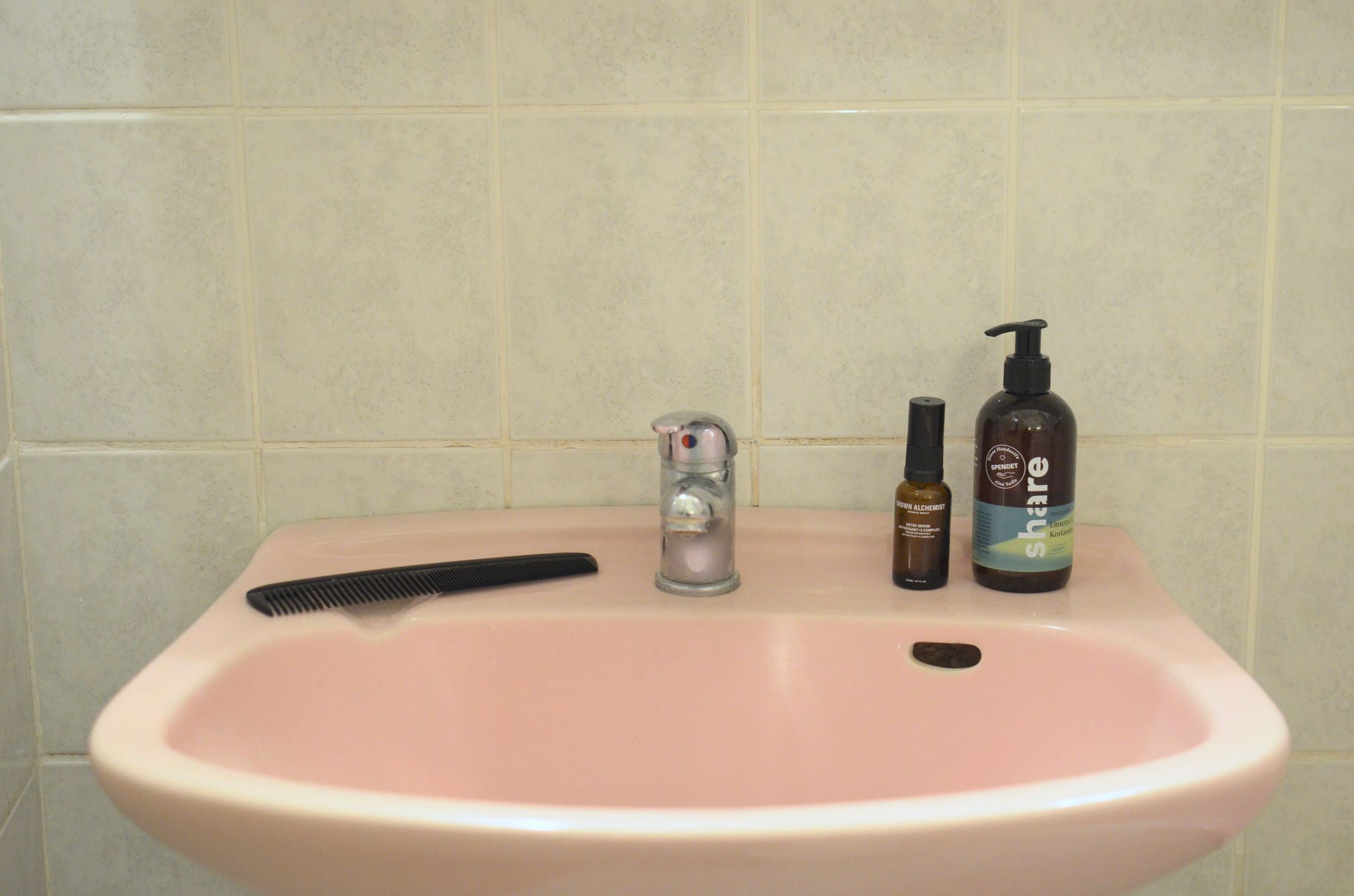Solo female traveler reviewing her packing list and toiletry bag Solo female traveler reviewing her packing list and toiletry bag