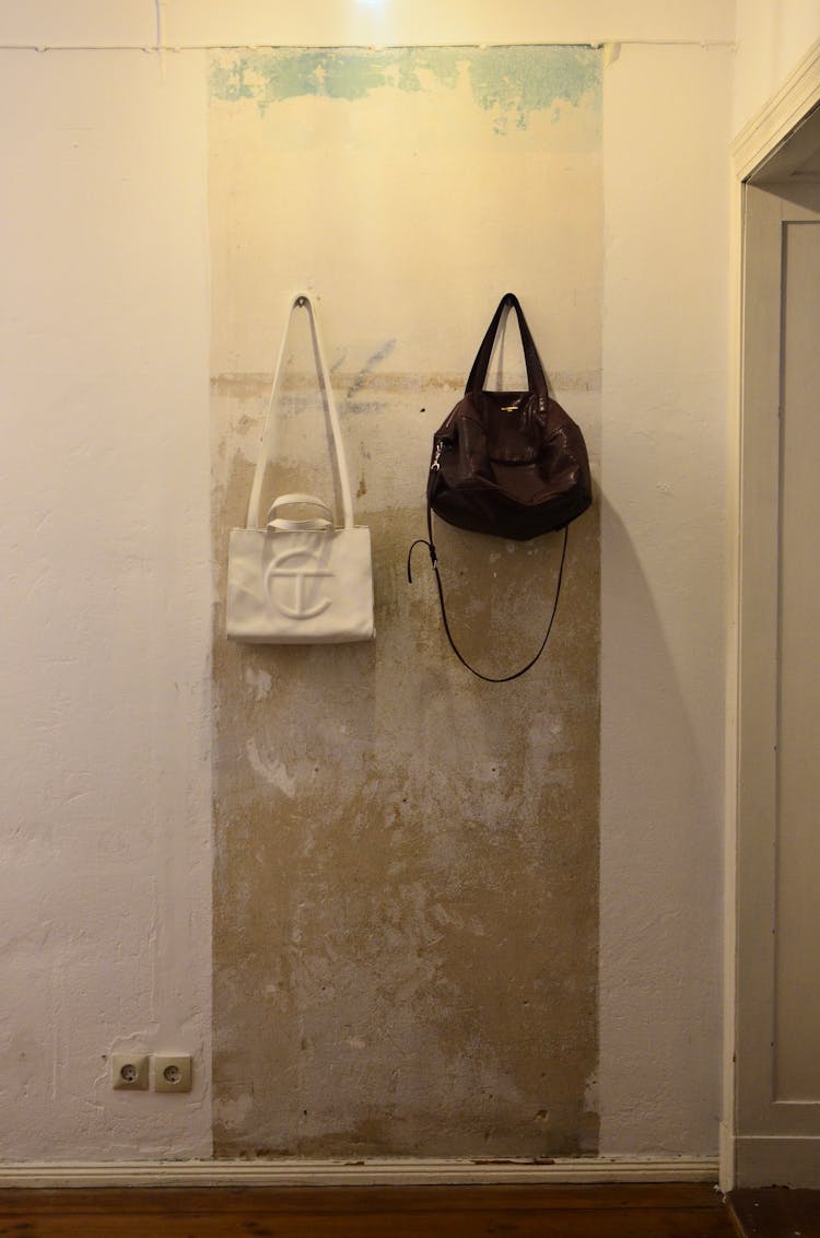 Bags Hanging On Wall At Home