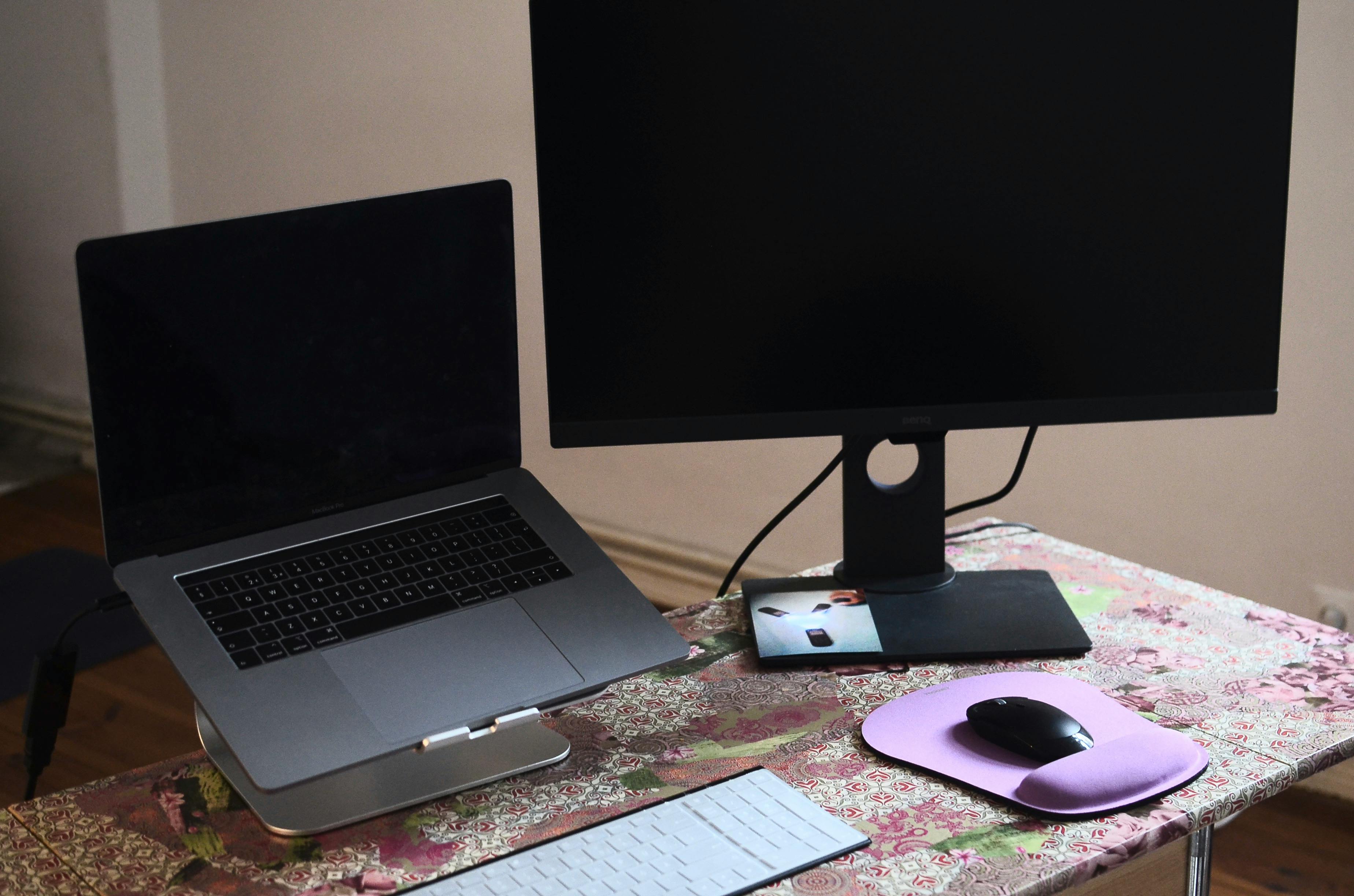 laptop and monitor on desk