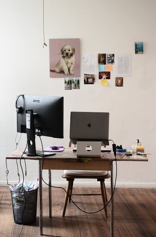 Free Modern computers on desk in room Stock Photo