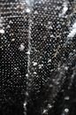 Abstract background of shiny fabric with sequins