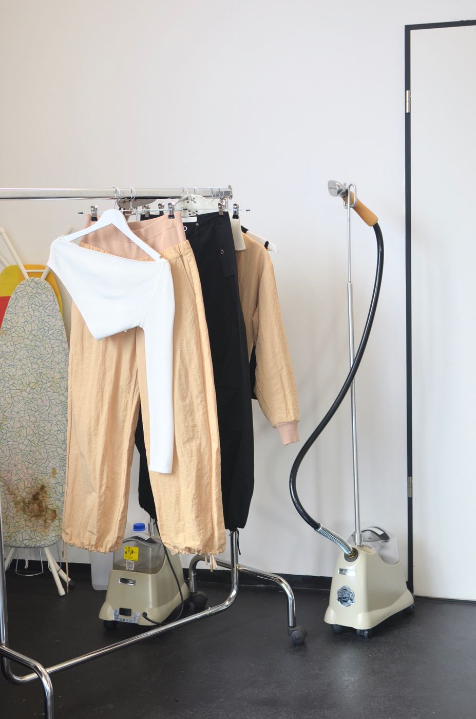 Freshly steamed and pressed clothes on a rack