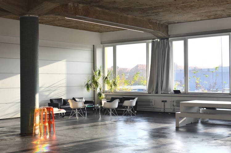 Interior Of Spacious Lobby With Armchairs