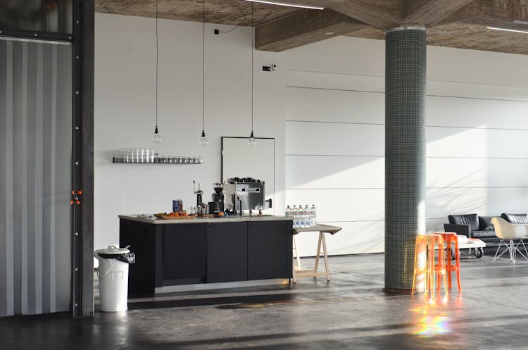 Kitchen Counter In An Open Living Space With High Ceiling