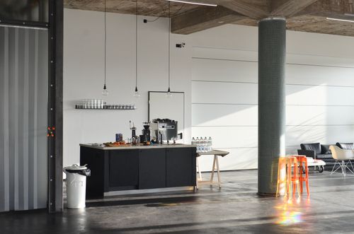 Free Spacious open kitchen with modern furnishings and industrial design. Stock Photo
