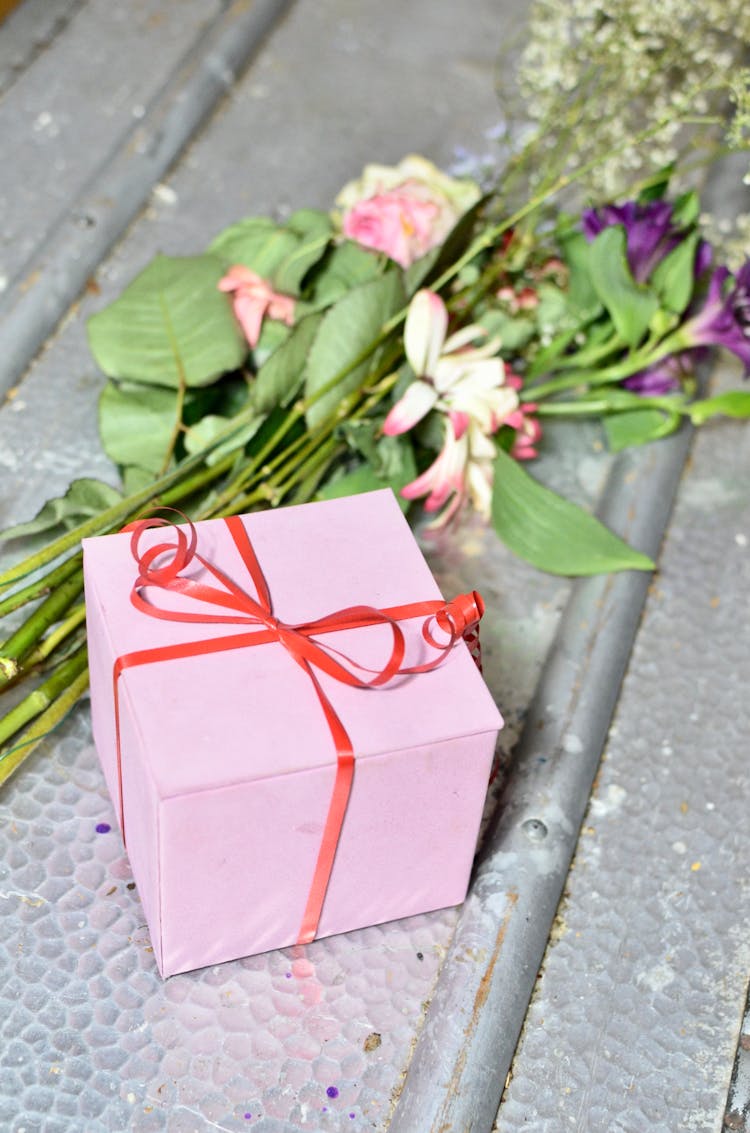 Gift Box With Bouquet Of Flowers