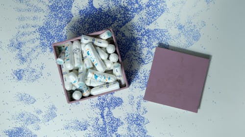 Box with heap of tampons