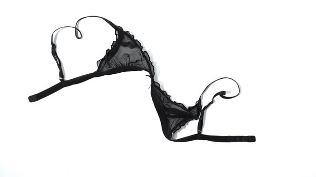 Single top bra piece of feminine lace black lingerie isolated on white background