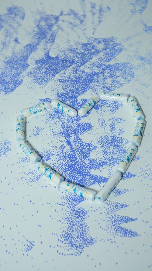 Symbol of heart made out of tampons