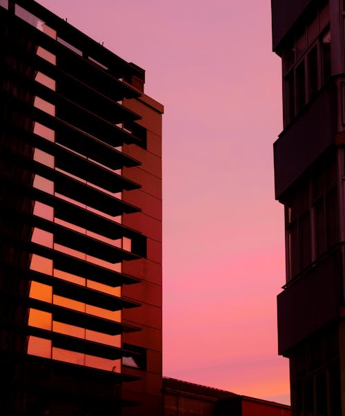 Brown Concrete Building during Sunset