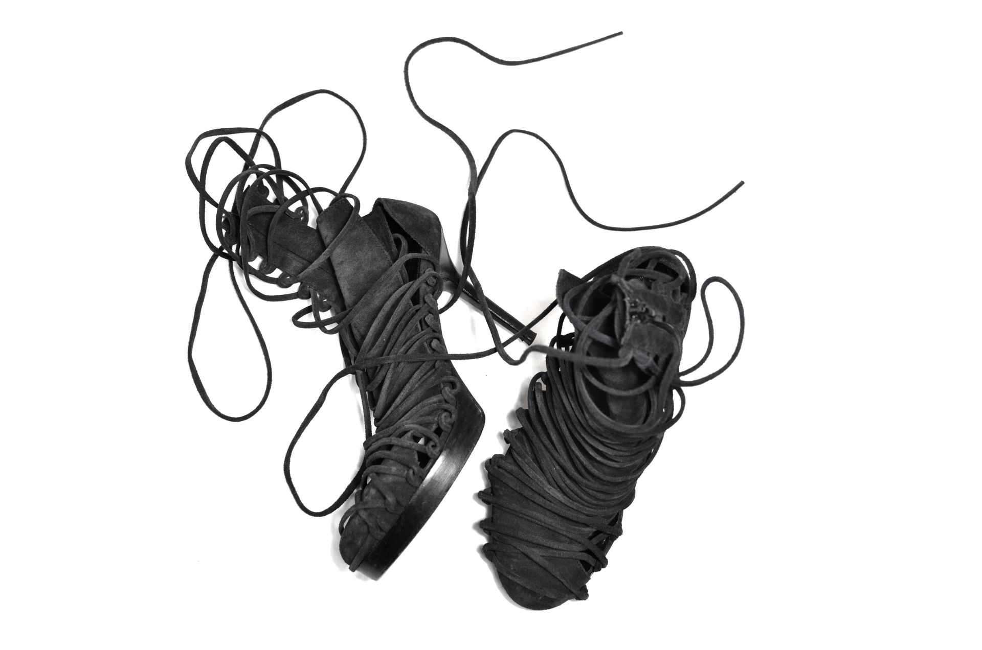 Modern stylish pair of shoes with long lacing