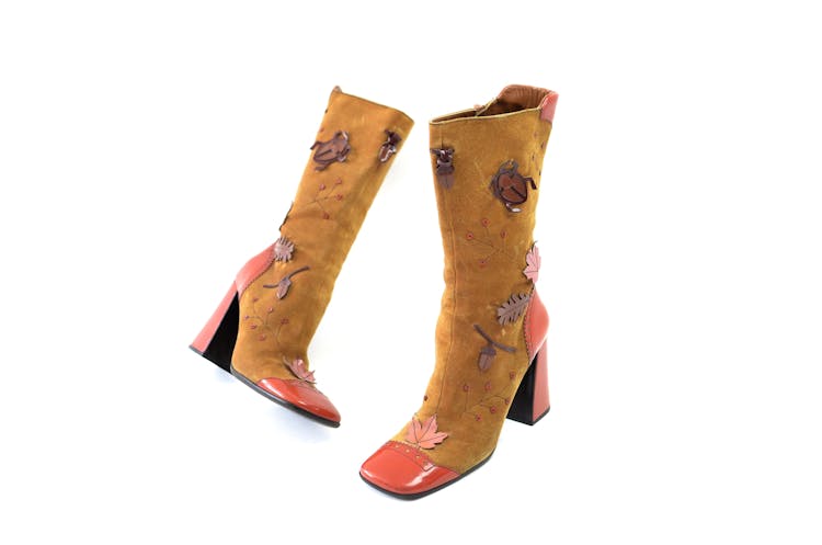 Stylish Pair Of Vintage Boots Decorated With Leaves And Bugs