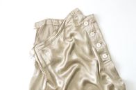 Crumpled gray silk skirt placed inside out