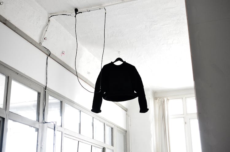 Pullover On Hang In Simple Room