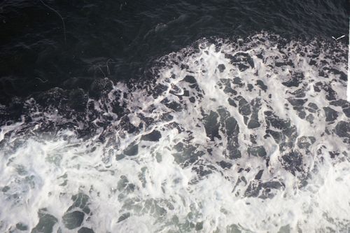 Free From above of deep ocean with wavy and foamy water in windy day Stock Photo