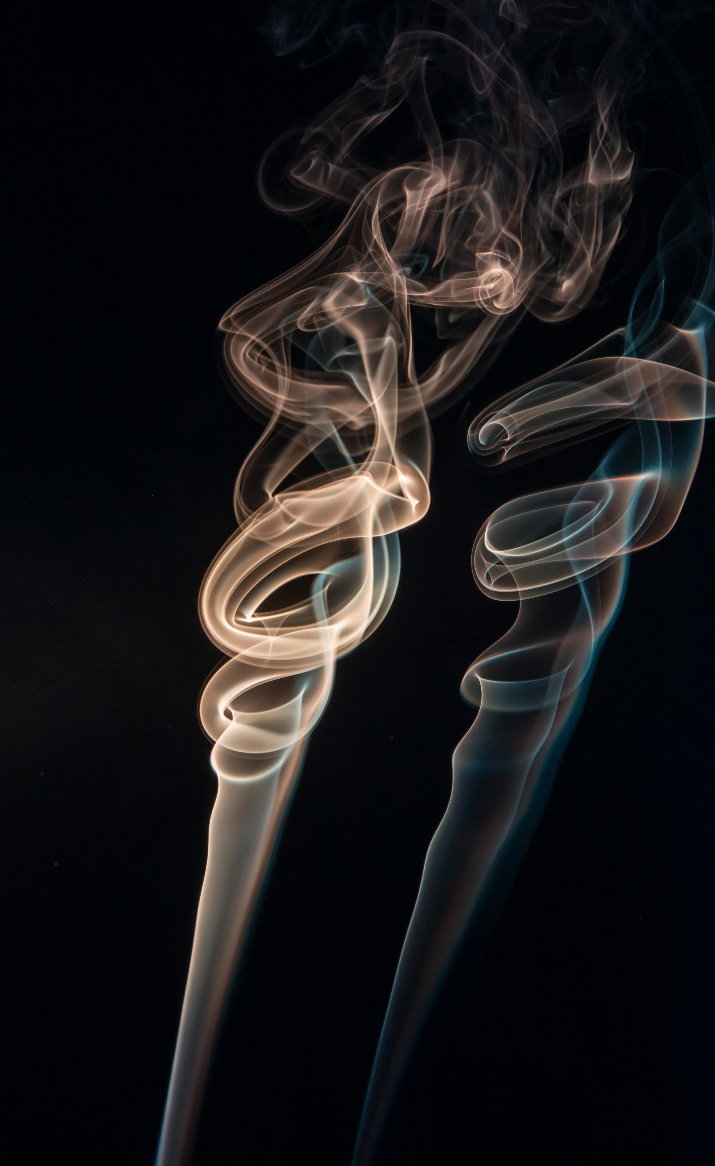 red smoke or steam on a black background for wallpapers and backgrounds  Stock Photo