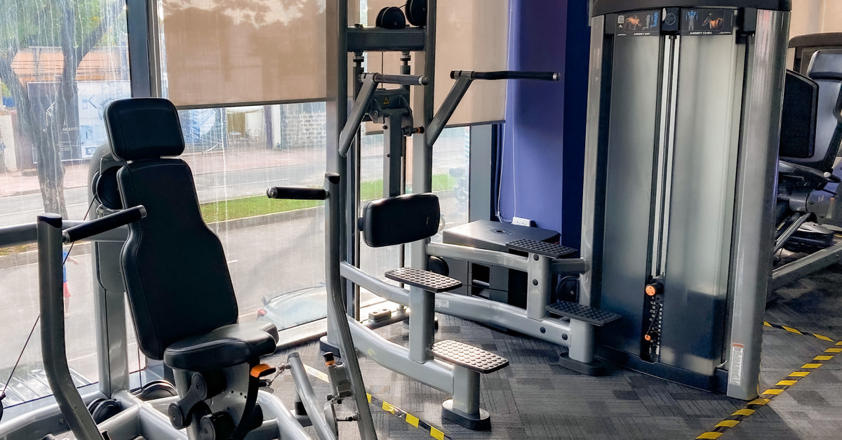 High-quality gym equipment set in a bright, indoor fitness center