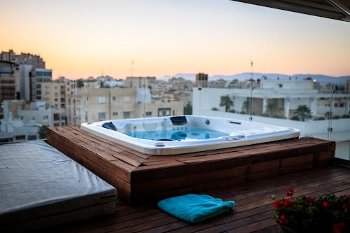A Jacuzzi on the Balcony Overlooking the City