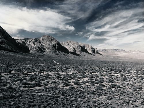 Free Majestic view of Red Rock Canyon's rugged mountains under a dramatic sky. Stock Photo