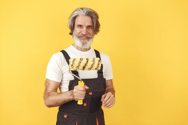 Painter holding a paint roller