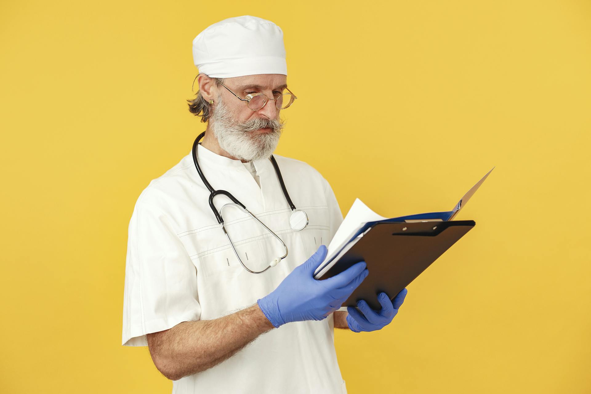 A Doctor Looking at Documents