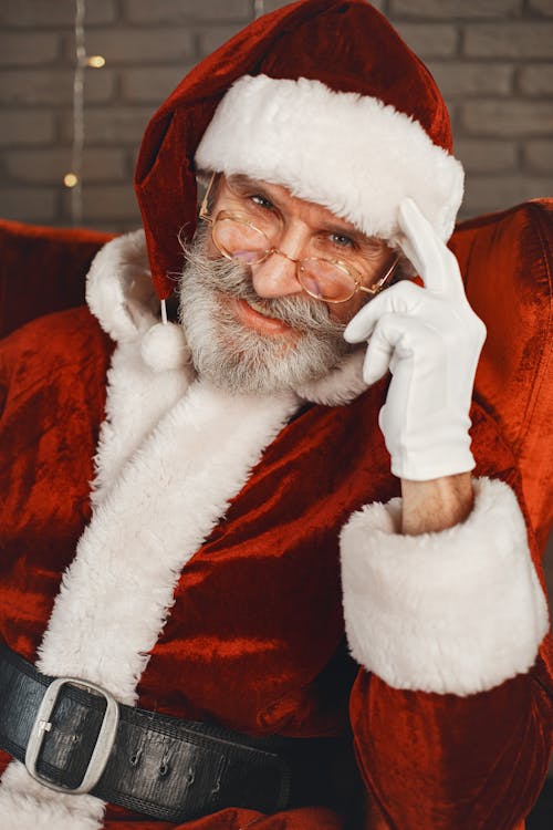 Portrait of a Senior Man Dressed as Santa Claus