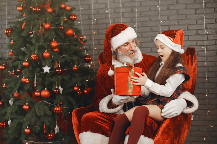 Girl Receiving Gift From Santa 