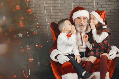 Girl and Boy With Santa Claus 