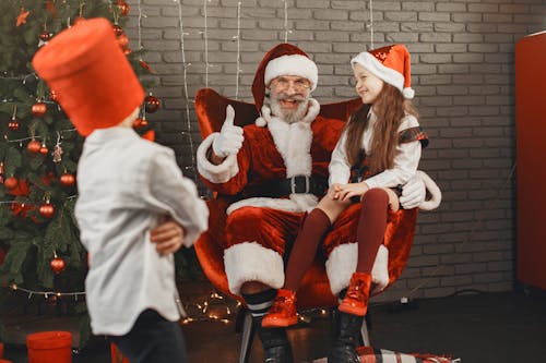 Girl and Boy With Santa Claus 