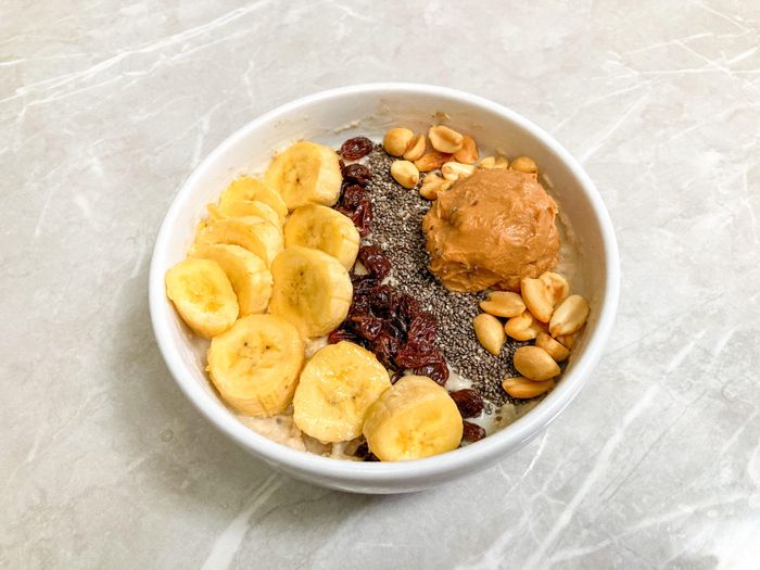 Oat bowl with banana, peanut butter and chia — Vegan Liftz on Pexels